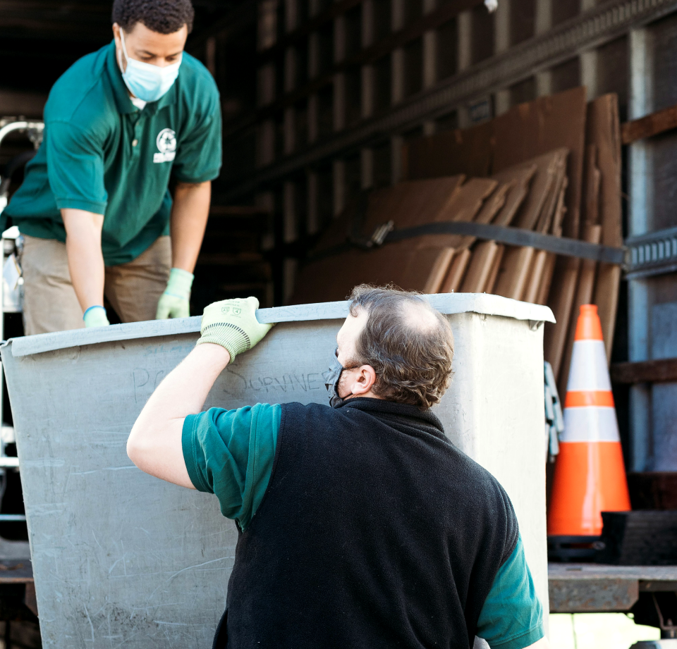 Factory Workers Moving Boxes